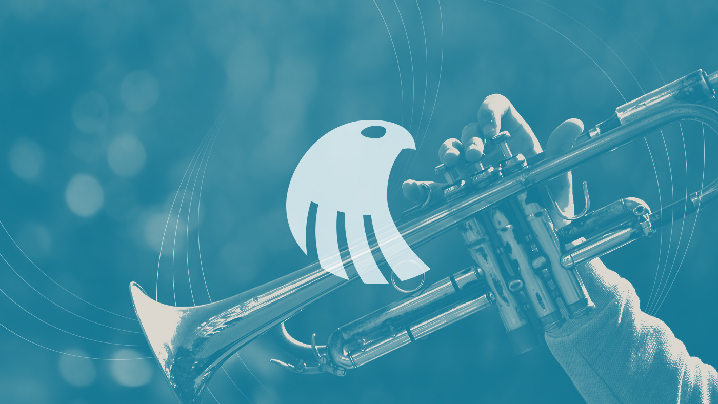 Saker Music logo on a picture of a trumpet